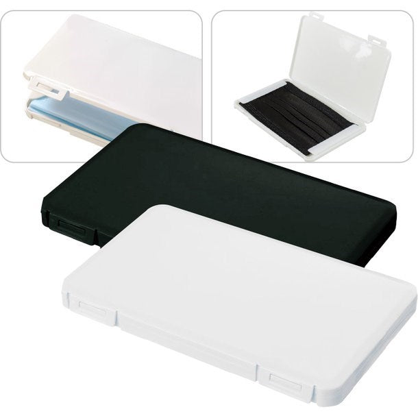 Schlichte Aufbewahrungsbox in weiss und schwarz